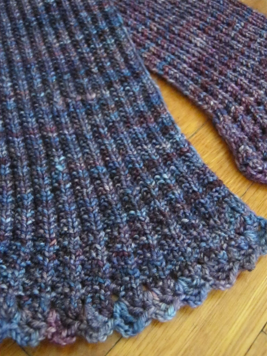 Ribbed scarf with crocheted edging detail